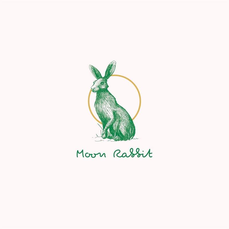 Logo phông chữ script với minh họa thỏ